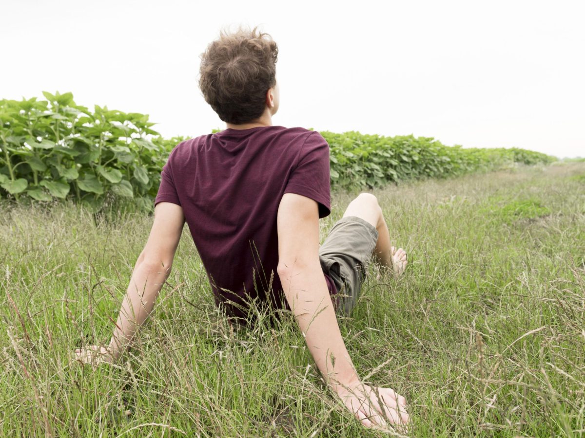boy-relaxing-ejoying-nature